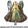 Celluloid angel with foil wings and skirt - vintage